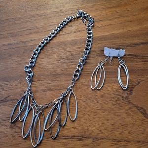 Brand new dangly necklace and earrings set
